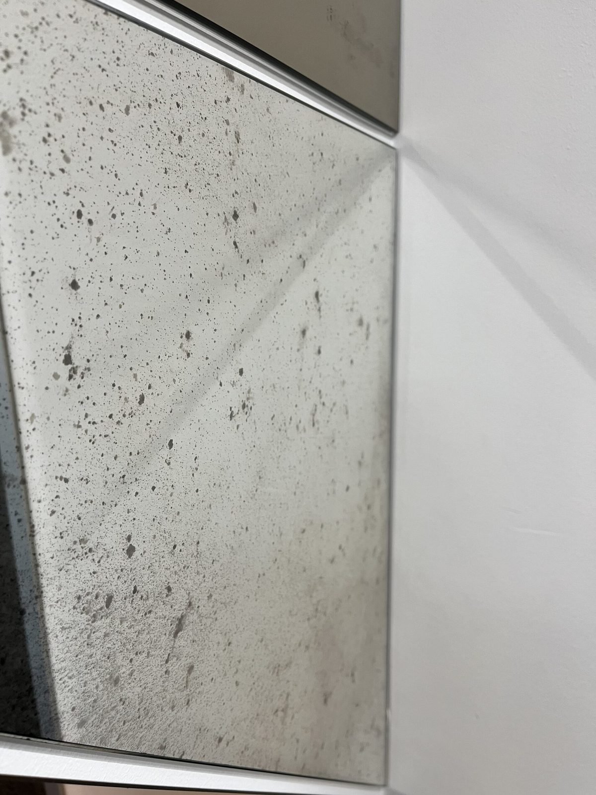 Antique mirror glass wall panelling