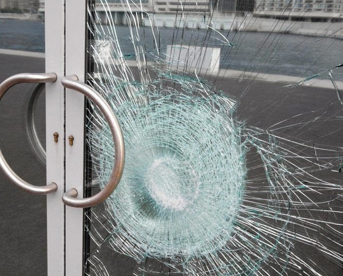 Broken laminated glass held together by its interlayer