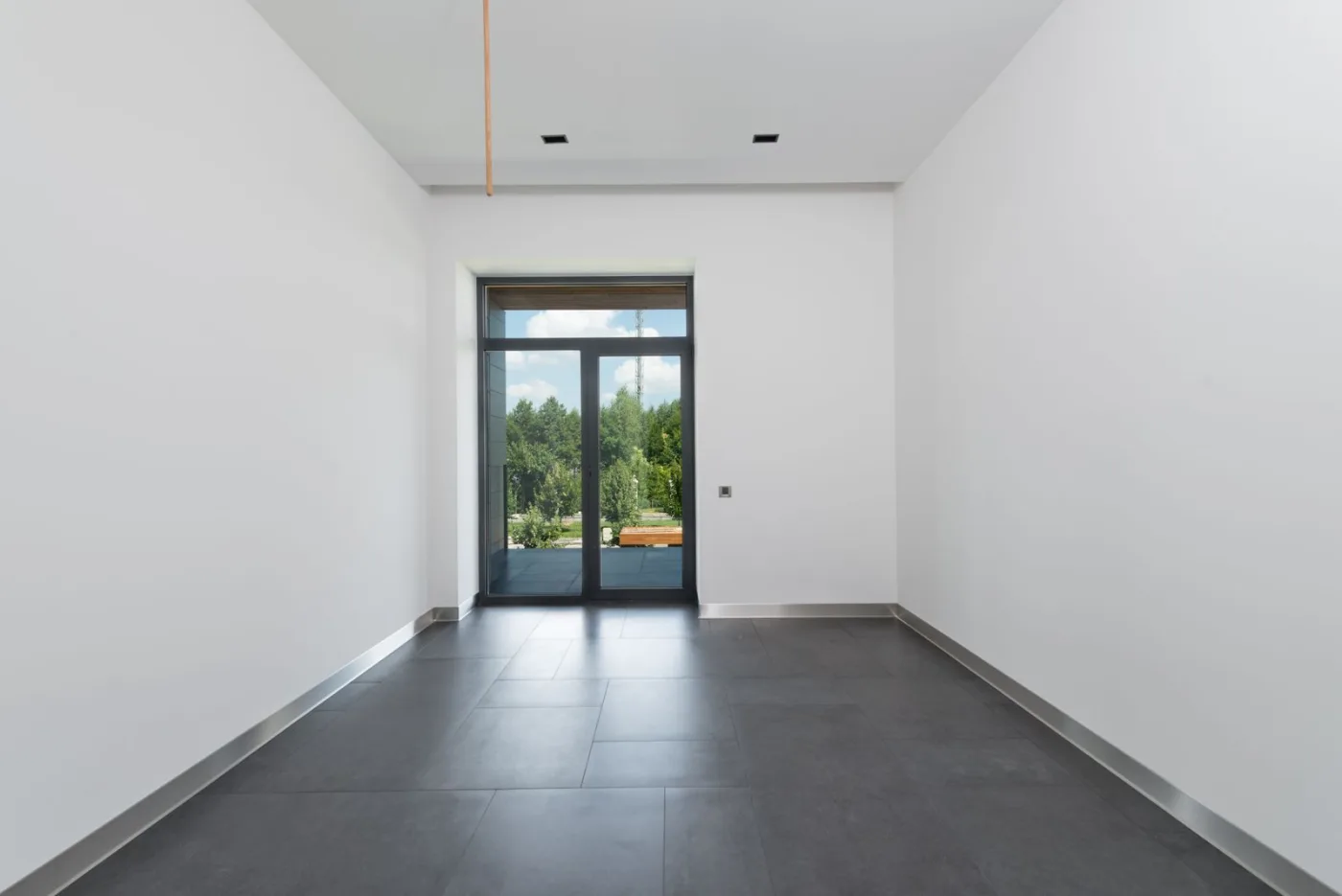 Glazed door in a modern apartment building corridor