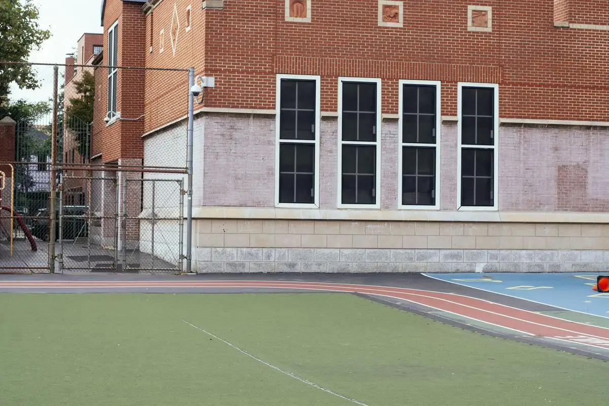Secondary school classroom block exterior with window banks — 44dB acoustic glazing
