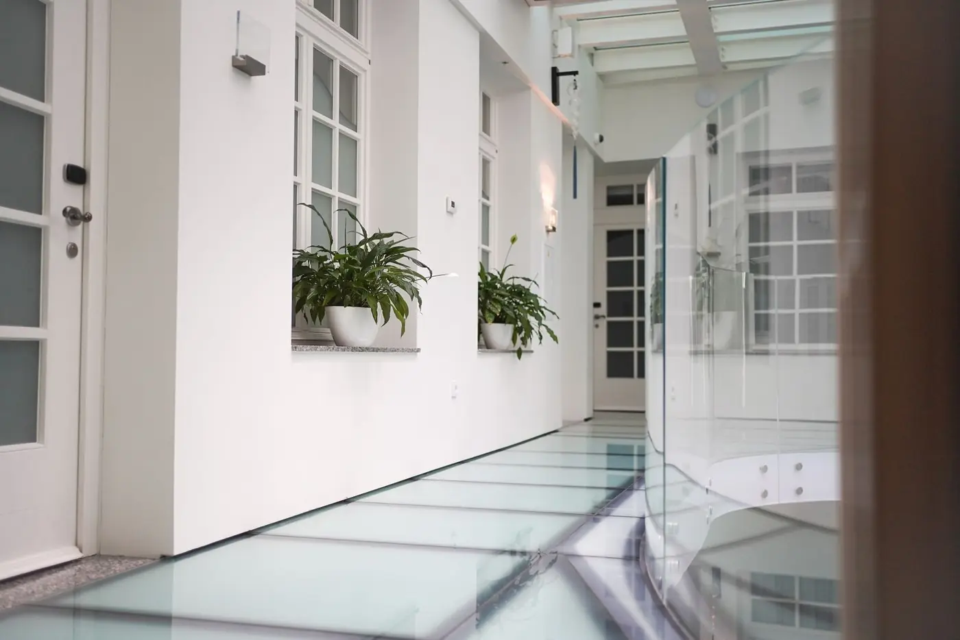 Structural walk-on glass floor panel installation