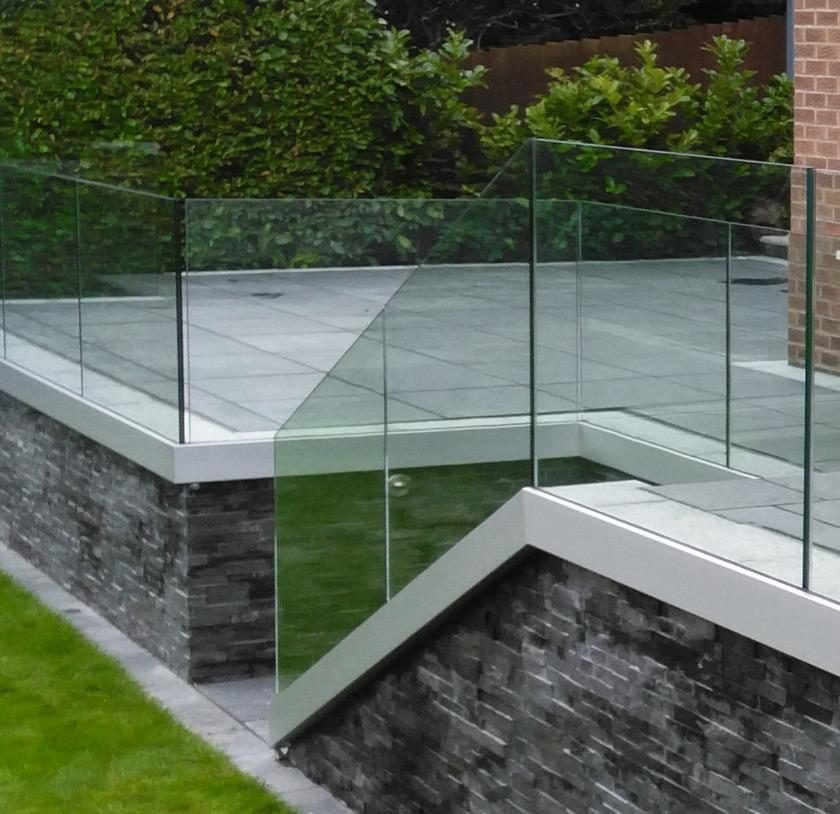 Frameless glass balustrade with channel fixing