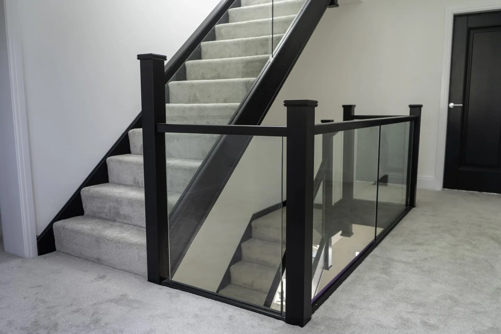 Frameless stair glass cut to the rake